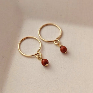 Sleeper earrings with red agate