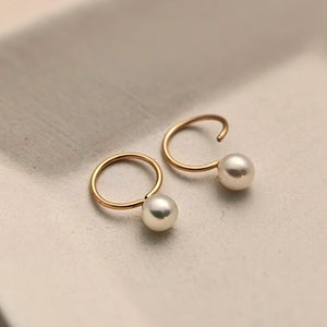 Tiny pearl hoops