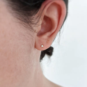 Tiny zirconia stud earrings